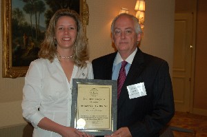 Pamela Maze, founder and president of Horizon Networks stands with John Royall, chairman and CEO of Horizon Networks.